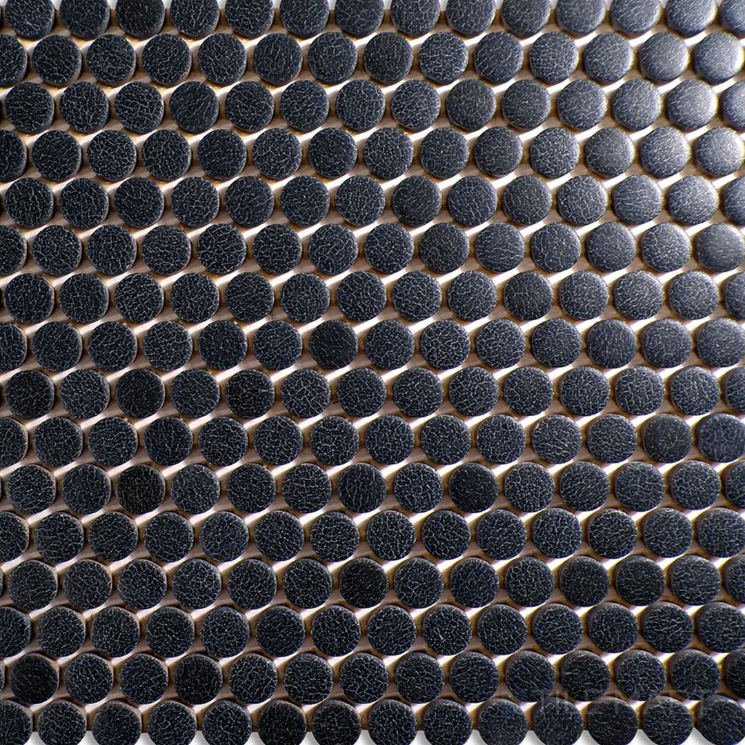 Direct top-down view of Inyo Ink Penny Round Matte Glazed Ceramic Mosaic, emphasizing its bold black color with a velvety matte finish.