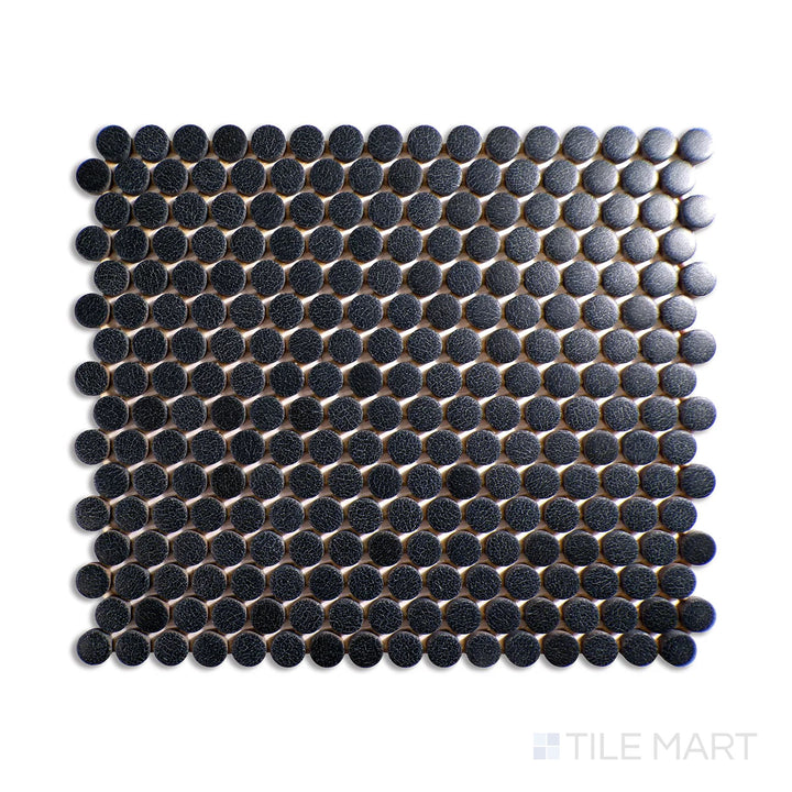 Diagonal view of Inyo Ink penny round matte glazed ceramic mosaic, showcasing a bold black color, matte texture, and classic circular tile layout.  