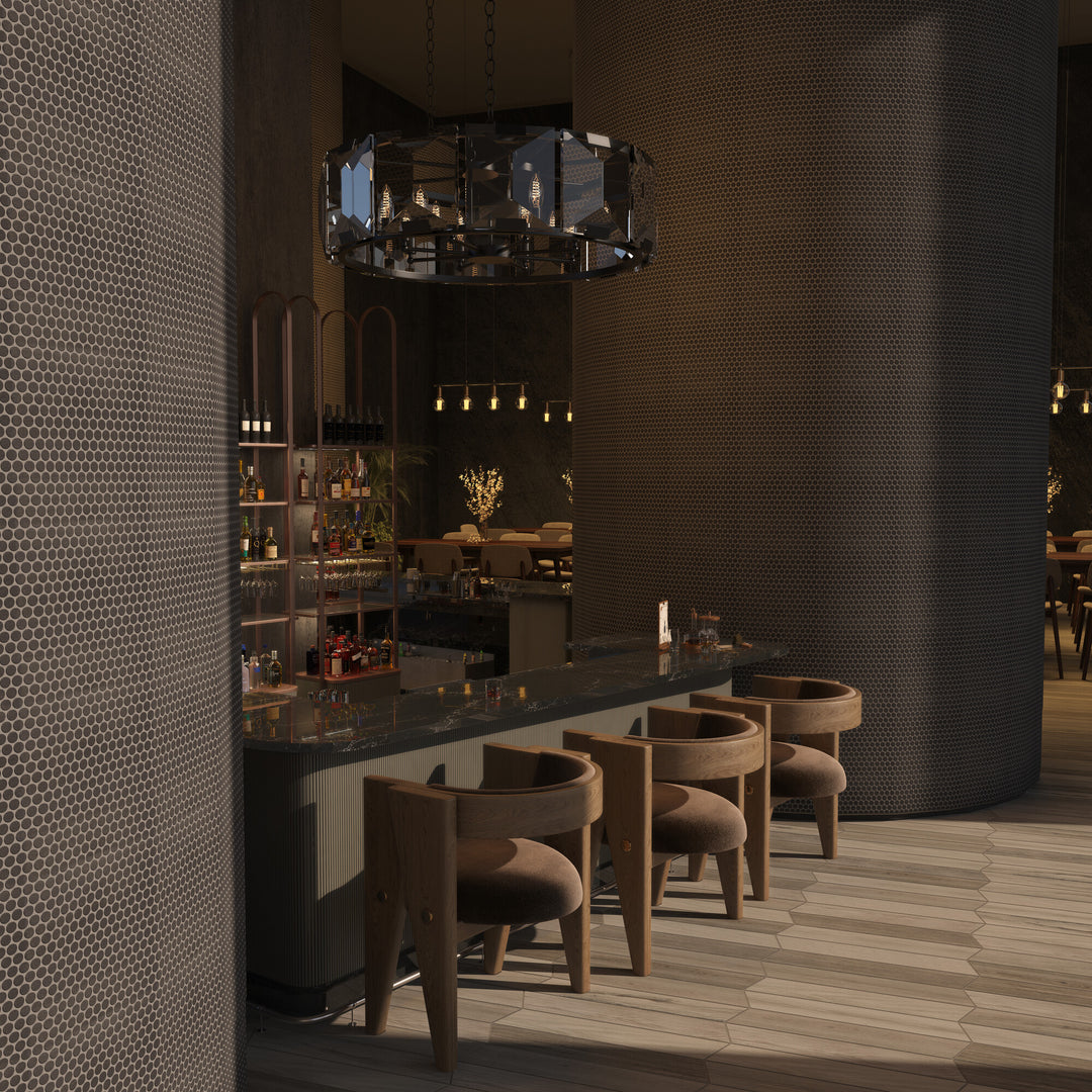 This roomscene captures the charm of Inyo Ink Penny Round matte glazed ceramic mosaic tile, with its rounded form and muted finish creating a textured visual rhythm.