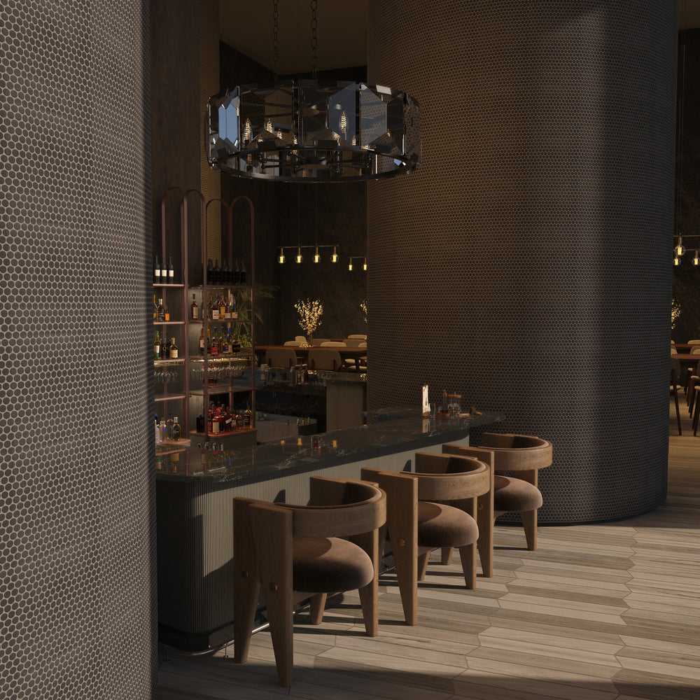 This roomscene captures the charm of Inyo Ink Penny Round matte glazed ceramic mosaic tile, with its rounded form and muted finish creating a textured visual rhythm.