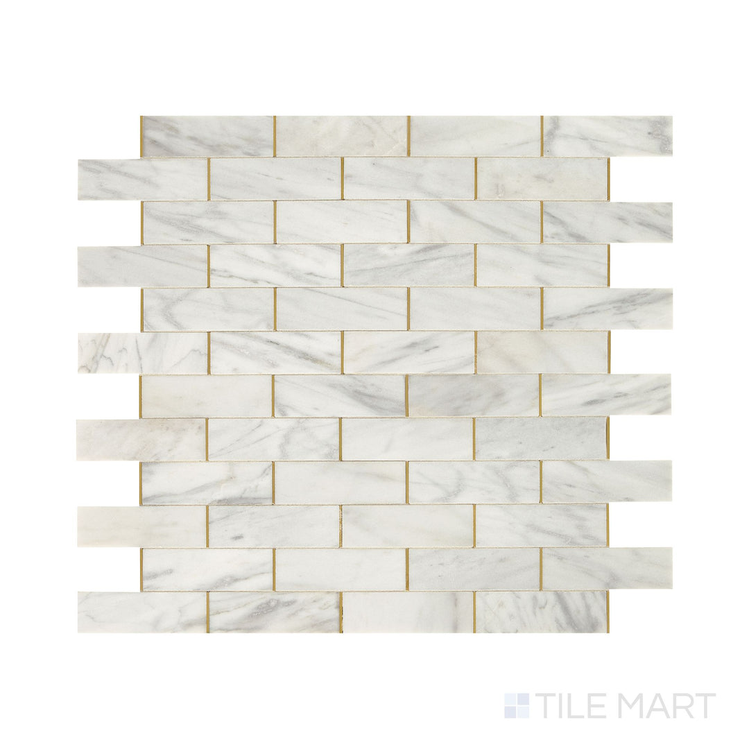 A top-down view of the Lavaliere Alluring White/Brass Melded honed marble mosaic showcases a delicate blend of white marble and brass accents, offering a luxurious and sophisticated touch to any design.