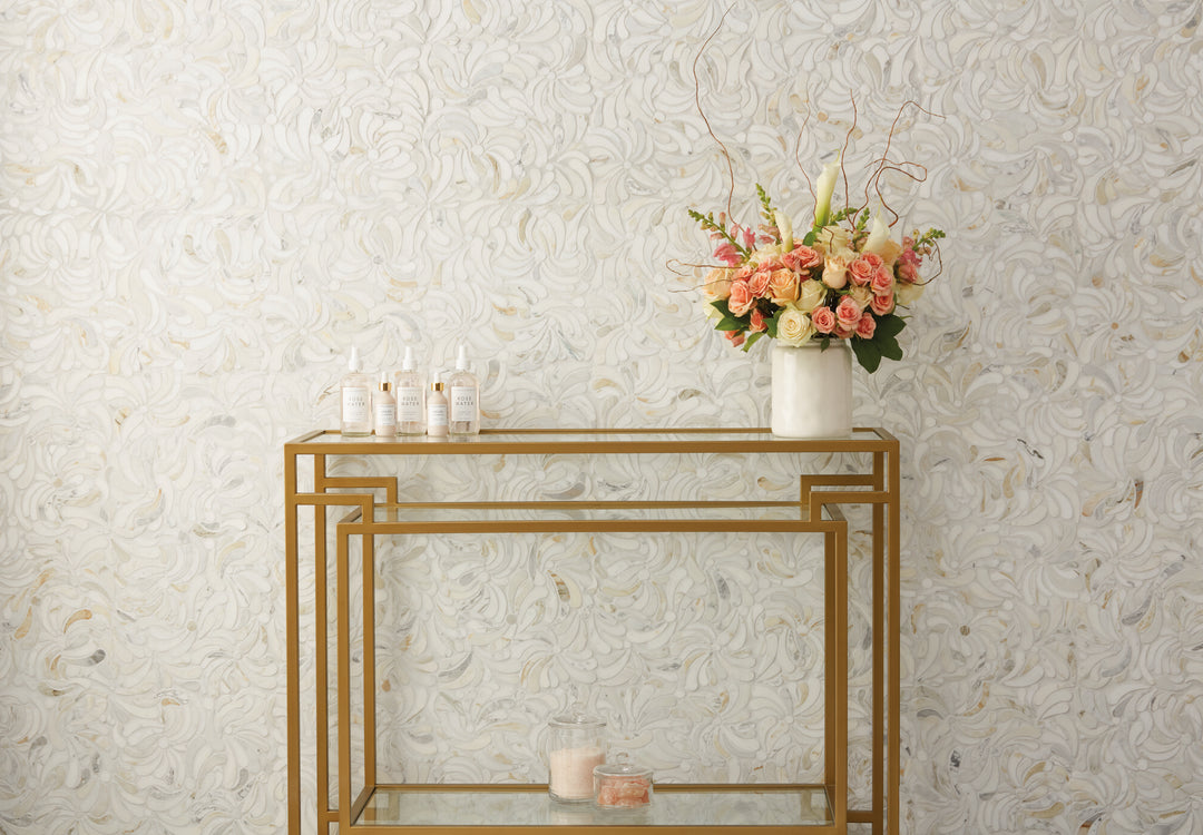 Lavaliere Calacatta Gold windblown honed mosaic brings the elegance of natural stone with a refined, artisanal texture.