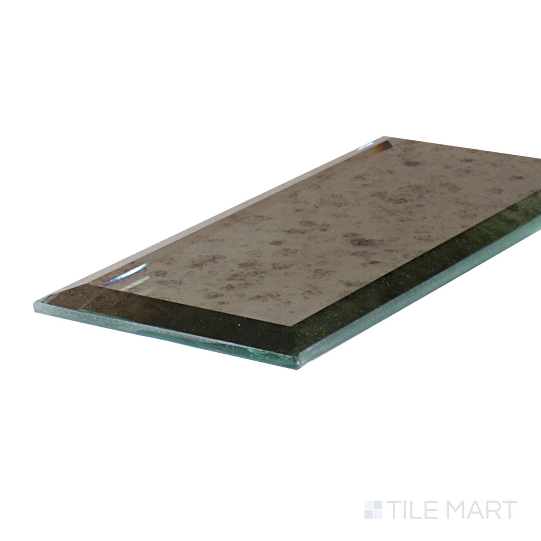 Corner-focused shot of Lavaliere Antique Mirror Bevel Polished Mosaic, highlighting its shimmering beveled mirror pieces arranged in an elegant mosaic pattern.