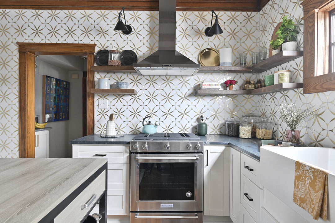 A soft Thassos White marble accented with brass in a delicate blossom design offers a refined and timeless appeal in this Lavaliere Thassos White/Brass Blossom polished mosaic.