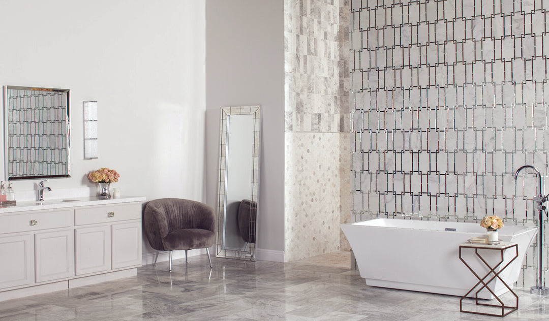 Seen in a completed interior, the Lavaliere First Snow Elegance and antique mirror Architectural Reflections polished marble mosaic delivers a striking, reflective statement