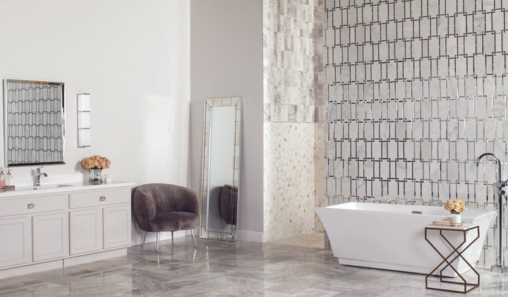 Seen in a completed interior, the Lavaliere First Snow Elegance and antique mirror Architectural Reflections polished marble mosaic delivers a striking, reflective statement