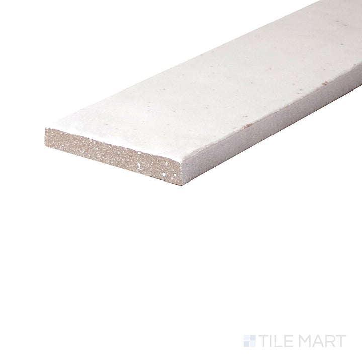 Corner shot of Remedy Elixir 2X10 Glossy Glazed Porcelain, showcasing its sleek, high-gloss surface with a smooth, modern appeal.