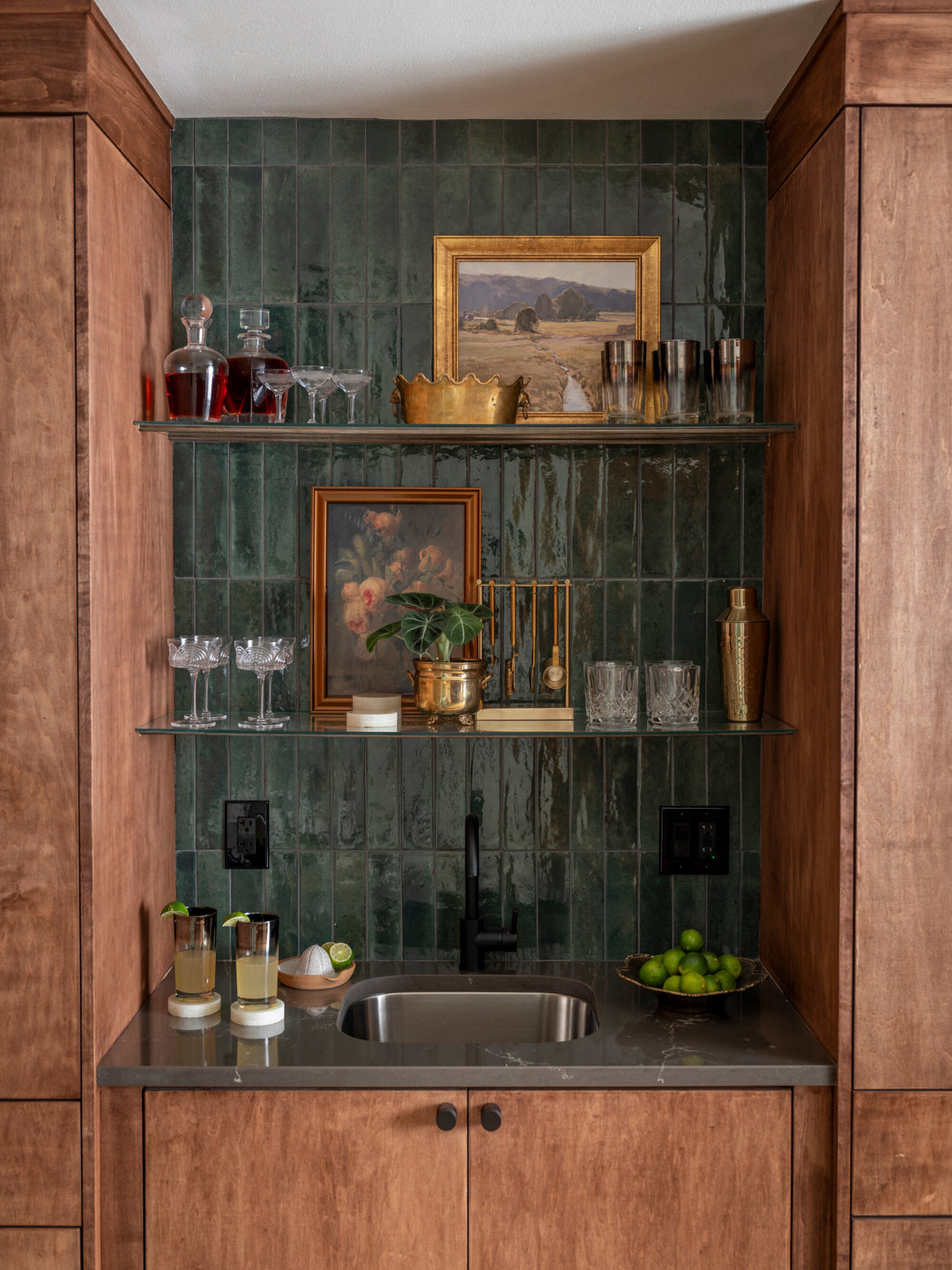 Remedy Herbal 2x10 glossy glazed porcelain tile displayed in a styled space, highlighting its natural tone and luminous gloss.