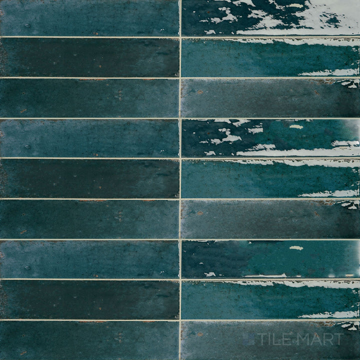 Flat-lay image of Remedy Hydro 2X10 Glossy Glazed Porcelain, emphasizing its elongated design and reflective surface.