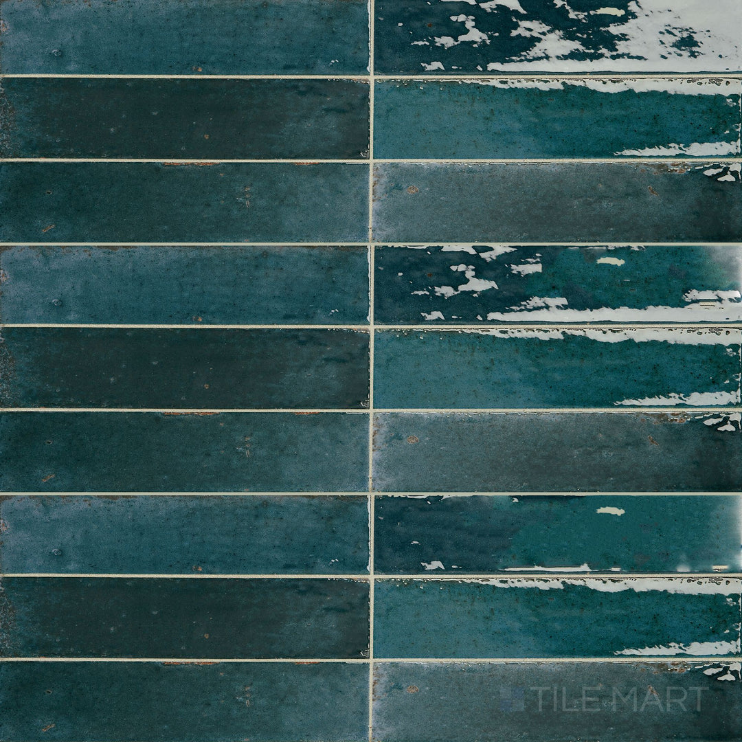 Flat-lay image of Remedy Hydro 2X10 Glossy Glazed Porcelain, emphasizing its elongated design and reflective surface.