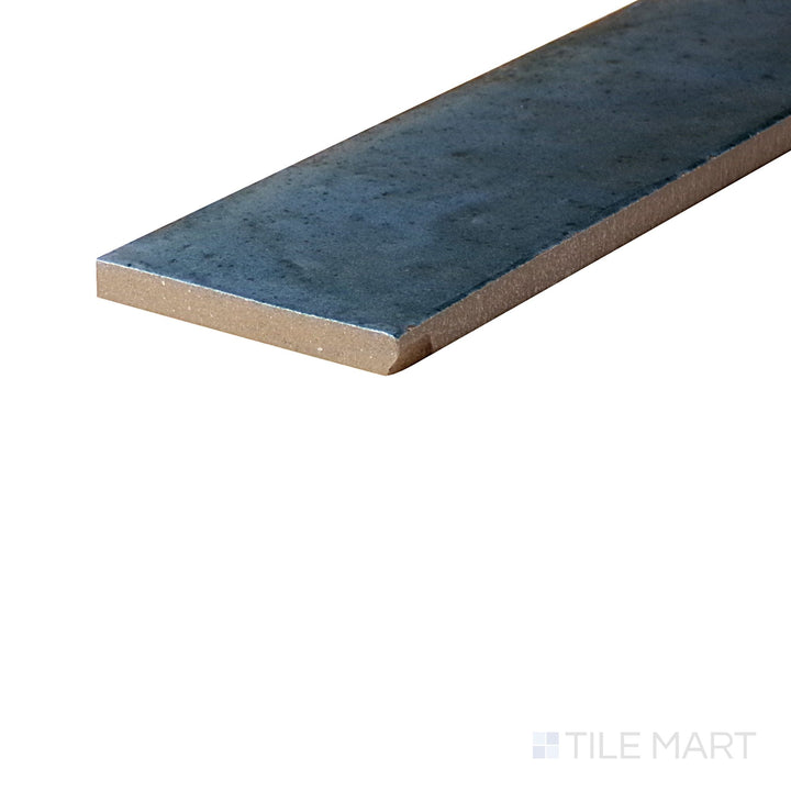 Close-up corner shot of Remedy Hydro 2X10 Glossy Glazed Porcelain, featuring its deep aquatic hues with a polished sheen.