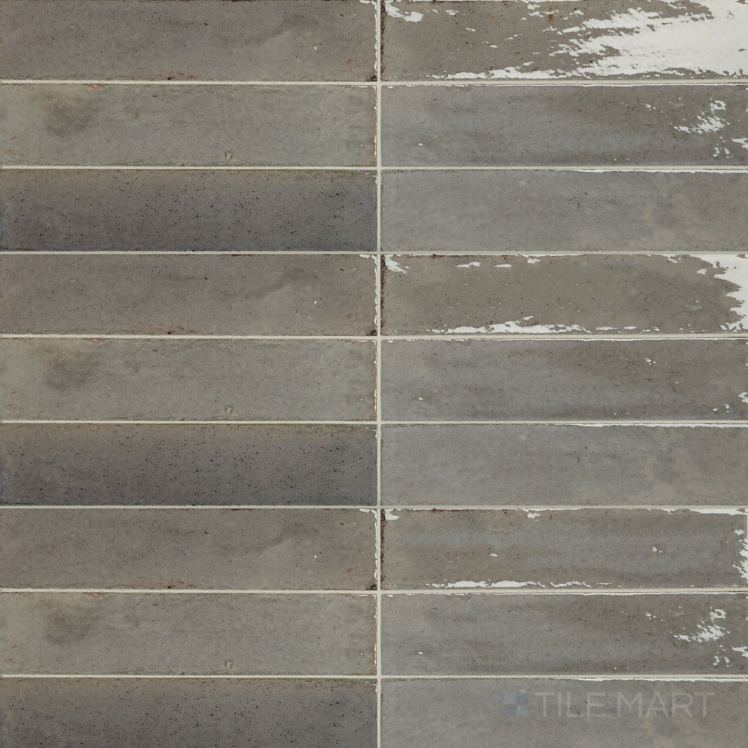 Top-down view of Remedy Zen 2x10 glossy glazed porcelain tile showing its smooth surface and linear layout detail.