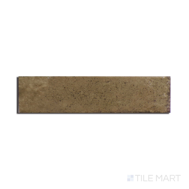 Angled shot of Remedy Antidote 2x10 glossy glazed porcelain tile, featuring a bold, sophisticated shade, a smooth reflective surface, and a contemporary elongated look.  