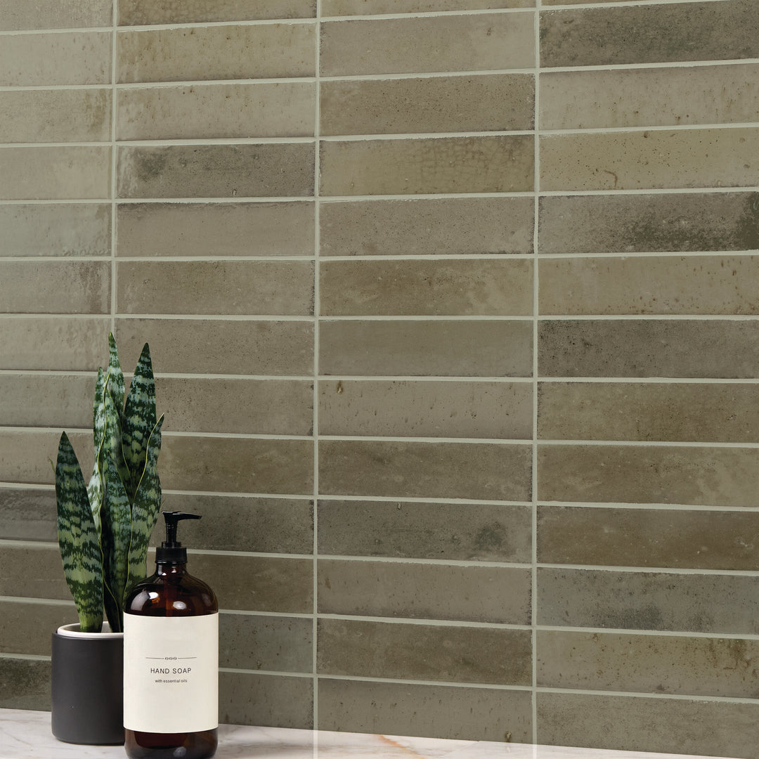 A bold, refined color with a lustrous finish creates a modern and dynamic appeal in this Remedy Antidote 2x10 glazed porcelain tile.