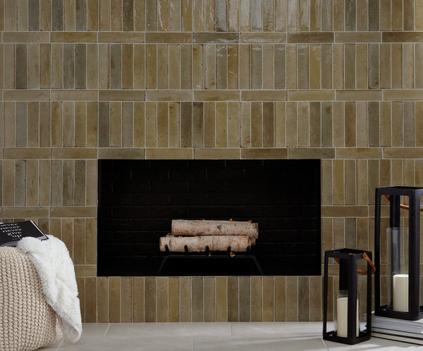Displayed in a real-world installation, the Remedy Antidote 2x10 glossy glazed porcelain tile adds visual interest through its slim proportions and sheen