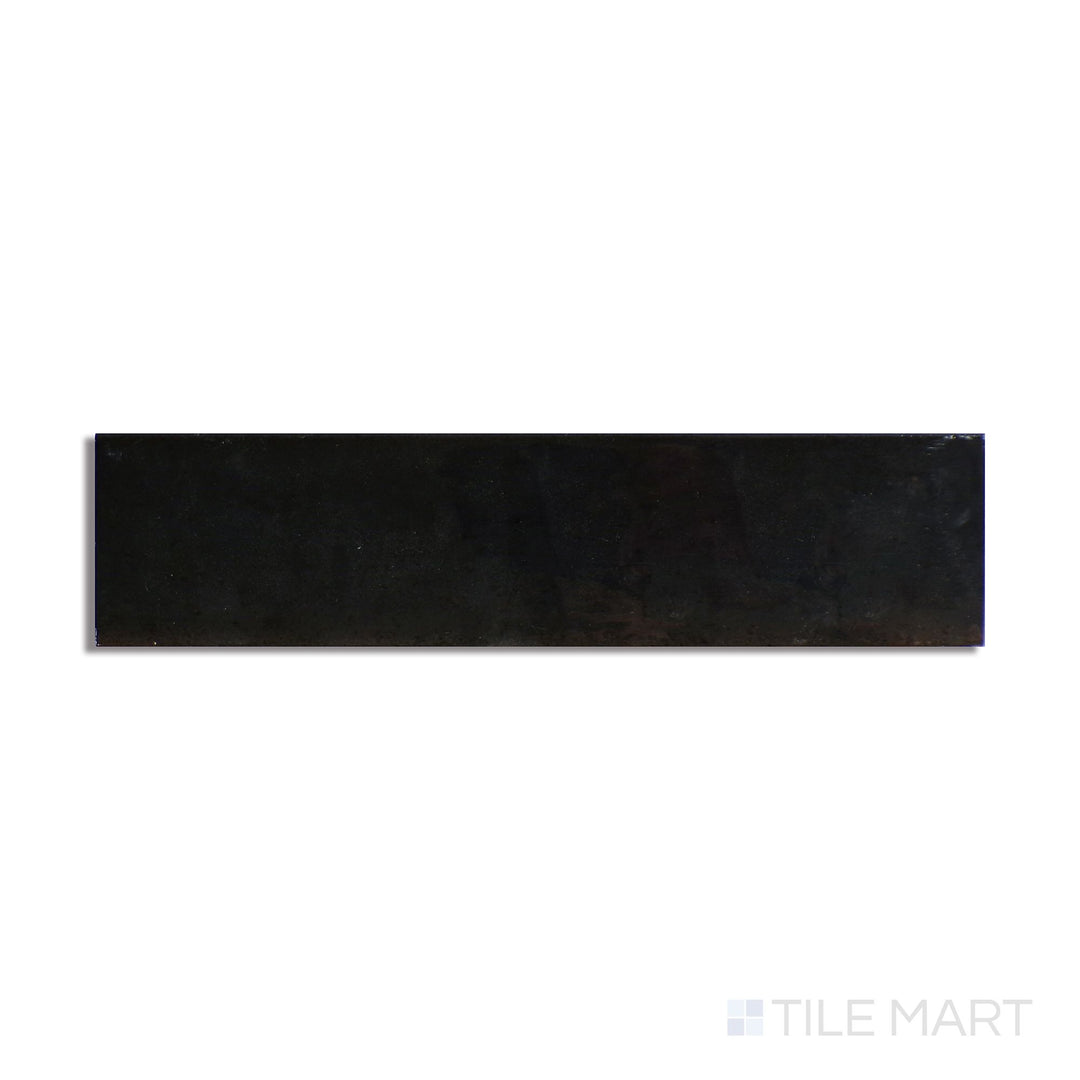 Diagonal view of Remedy Alchemy 2x10 glossy glazed porcelain tile, showcasing a metallic-inspired sheen, a lustrous glossy coating, and a modern, streamlined shape.  