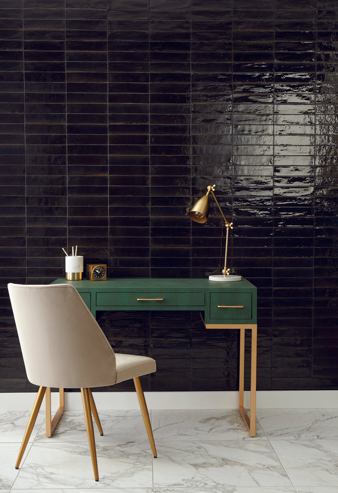 Remedy Alchemy 2x10 glossy glazed porcelain tile displayed in a sleek layout, reflecting its rich color and smooth glazed surface.