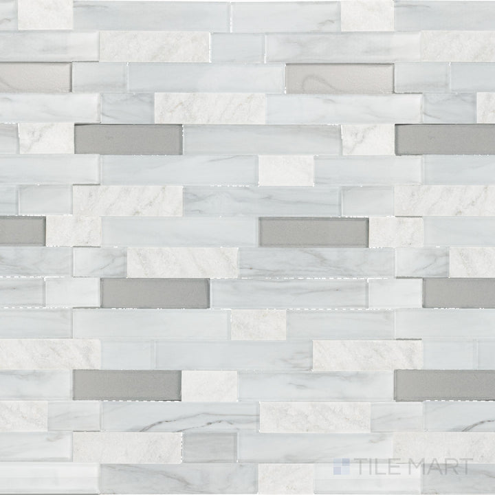 A top-down view of the Perfit Mosaix White Carrara & Glass Random Linear Split Face Carrara mosaic tile highlights its elegant blend of classic White Carrara marble and textured split-face details, offering depth and natural beauty.
