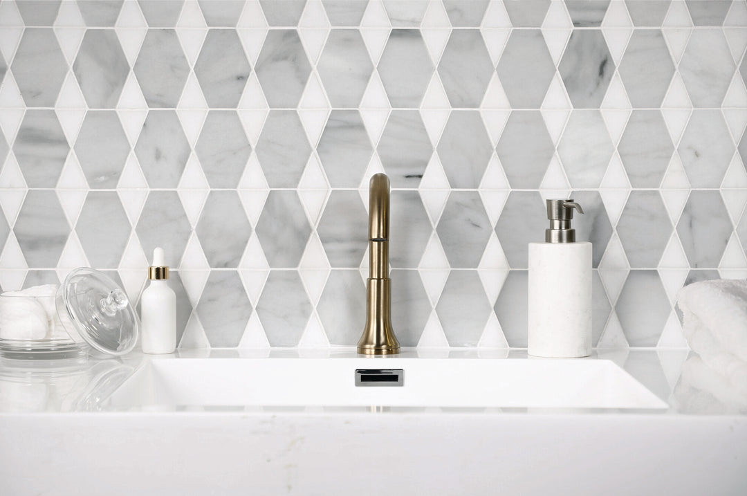 A striking combination of Saran White and Thassos marble with a polished surface enhances depth and elegance in this Perfit Mosaix Reverse mosaic.