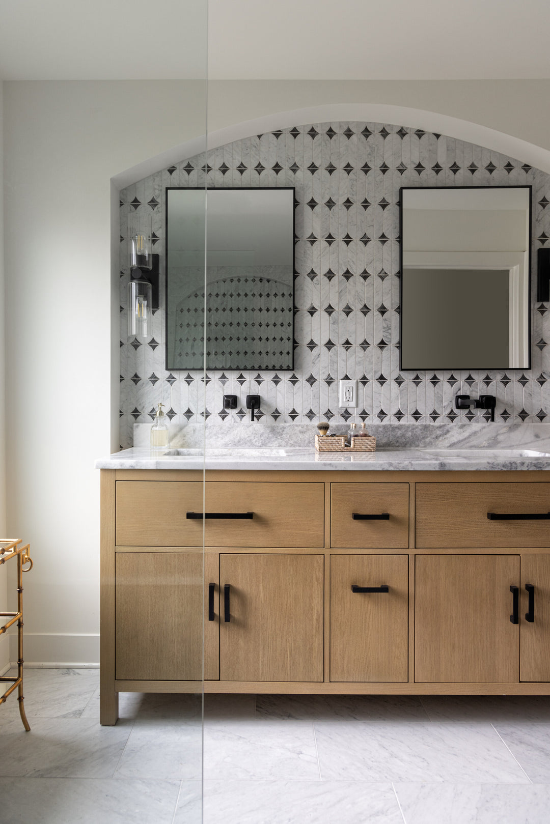 Featured in a room setting, the Perfit Mosaix Ashen Palissandro and Carrara White Spring polished mosaic adds natural variation and elegant movement