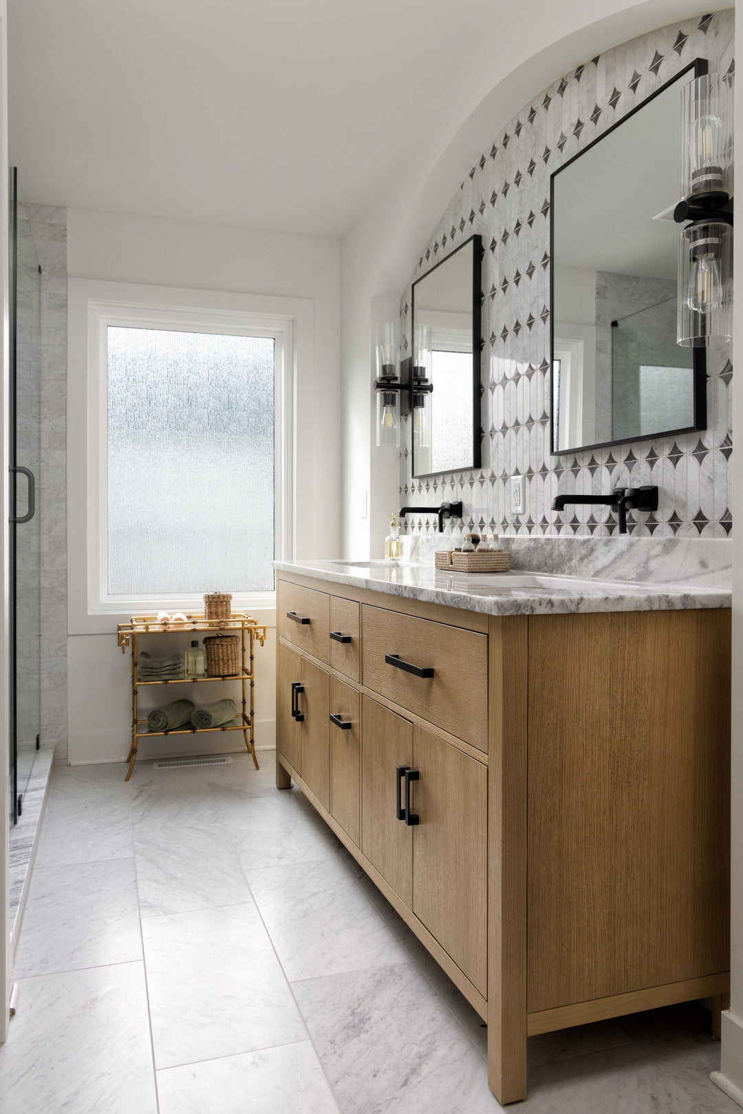 Showcasing natural variation, the Perfit Mosaix Ashen Palissandro & Carrara White Spring polished mosaic tile features layered stone textures and a refined shine.