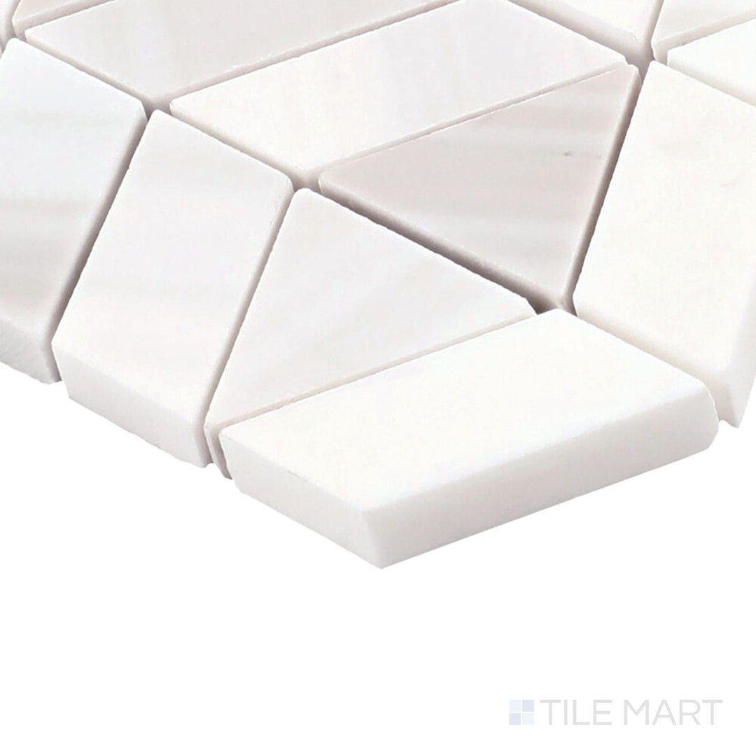 Angled close-up of Perfit Mosaix Calacatta Dolomiti Zipper Polished Marble Mosaic, showcasing its intricate zipper-like pattern with warm Calacatta veining.