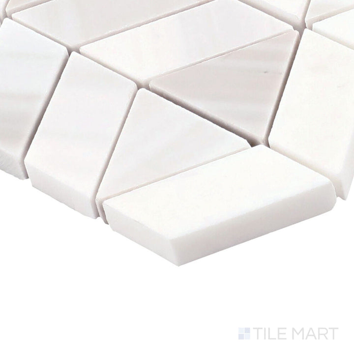 Angled close-up of Perfit Mosaix Calacatta Dolomiti Zipper Polished Marble Mosaic, showcasing its intricate zipper-like pattern with warm Calacatta veining.