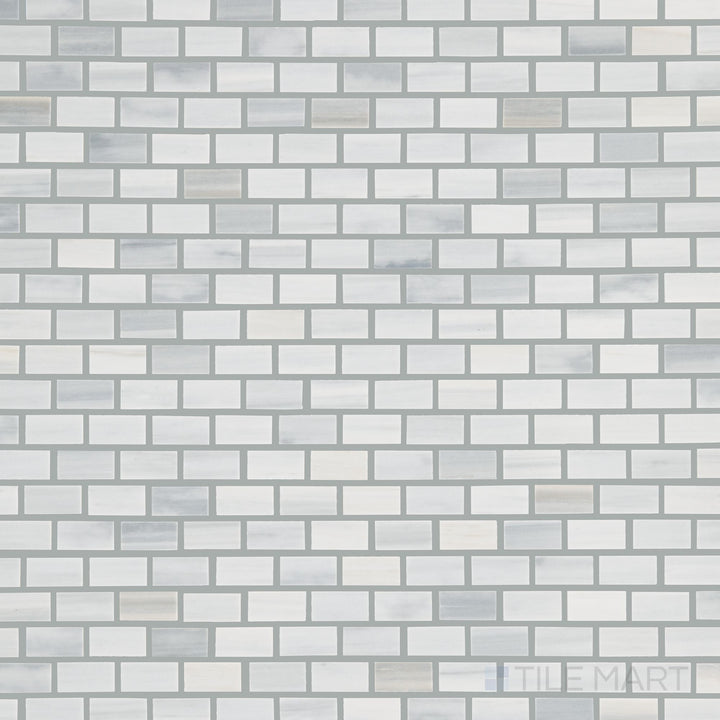 Viewed from the top, the Perfit Mosaix Grey Palissandro Offset polished marble mosaic tile presents a deep gray Palissandro marble with a dynamic offset pattern, offering a refined and structured look.