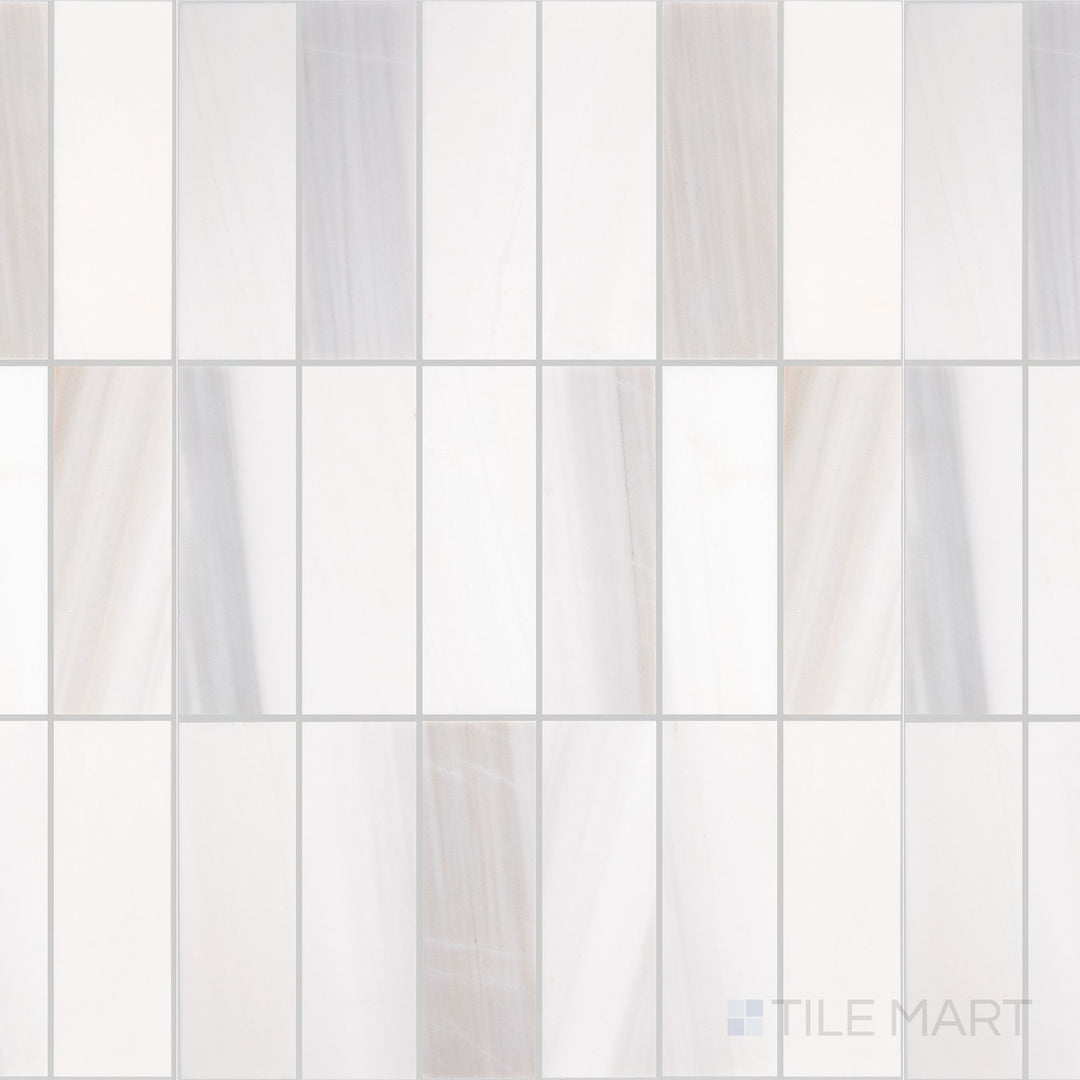 A top-down view of the Perfit Mosaix Calacatta Dolomiti Rectangle honed marble mosaic tile reveals the soft veining of Calacatta Dolomiti marble with a honed finish for a smooth, matte elegance.