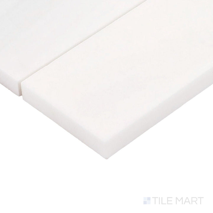 Corner-focused shot of Perfit Mosaix Calacatta Dolomiti Rectangle Honed Marble Mosaic, highlighting its rich Calacatta Dolomiti veining with a soft honed finish.