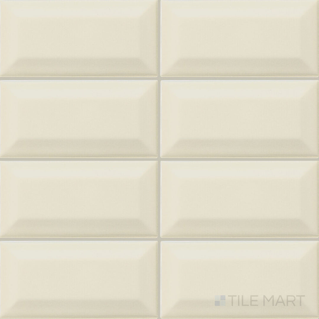 Shown as a complete tile, the Color Wheel Classic Almond 3x6 beveled glossy glazed ceramic tile features a warm neutral color and glossy finish