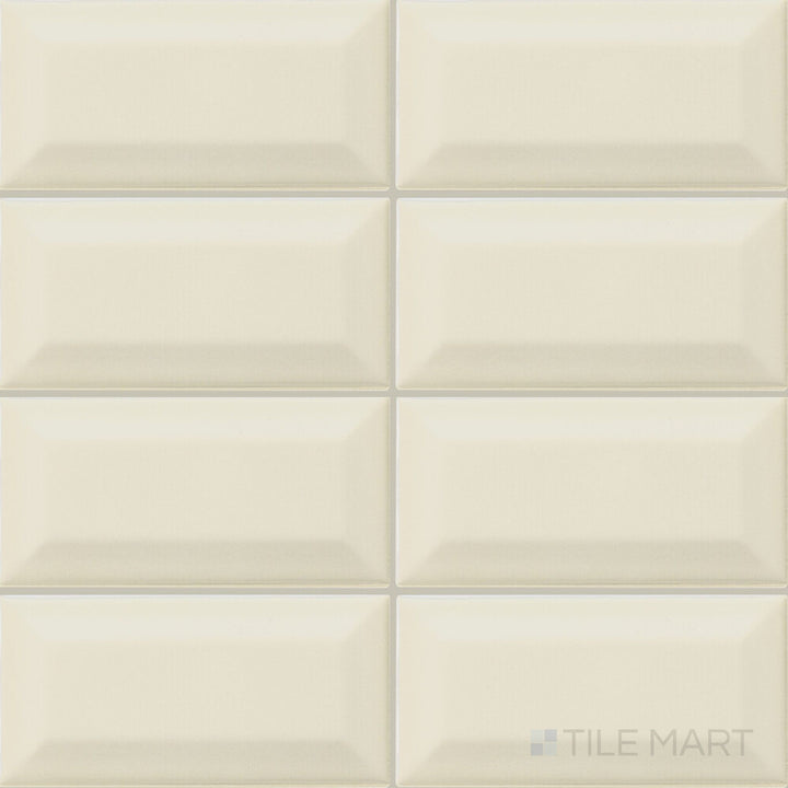 Shown as a complete tile, the Color Wheel Classic Almond 3x6 beveled glossy glazed ceramic tile features a warm neutral color and glossy finish