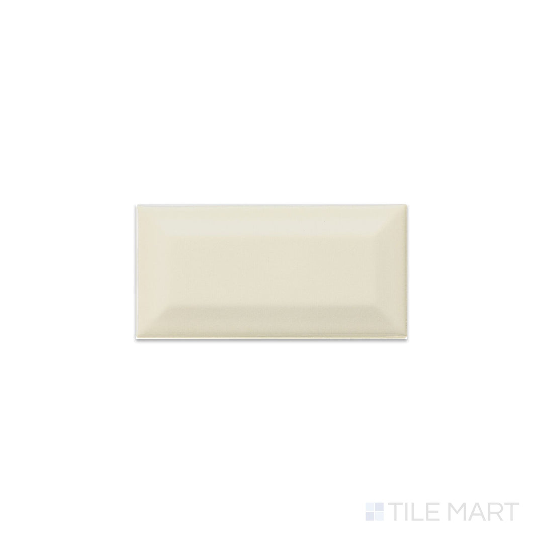 Overhead shot of Color Wheel Classic Almond 3X6 Beveled Glossy Glazed Ceramic, showcasing its smooth glaze and defined beveled shape.