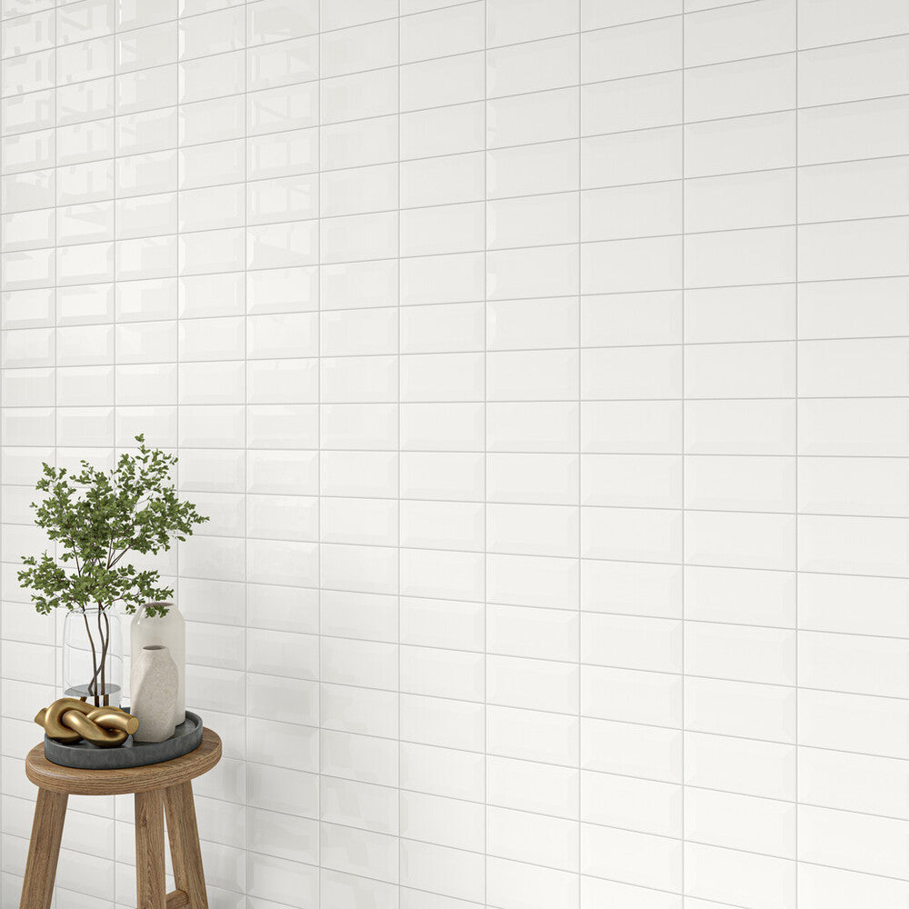 Roomscene with Color Wheel Classic Arctic White 3x6 beveled glossy glazed ceramic tile, drawing focus to its crisp white surface and reflective finish with timeless appeal.