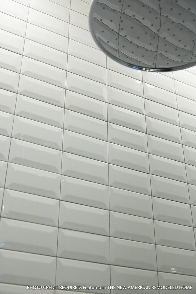 Color Wheel Classic Arctic White 3x6 beveled glossy glazed ceramic tile shown in a timeless setting, highlighting its crisp white color and classic beveled edge.