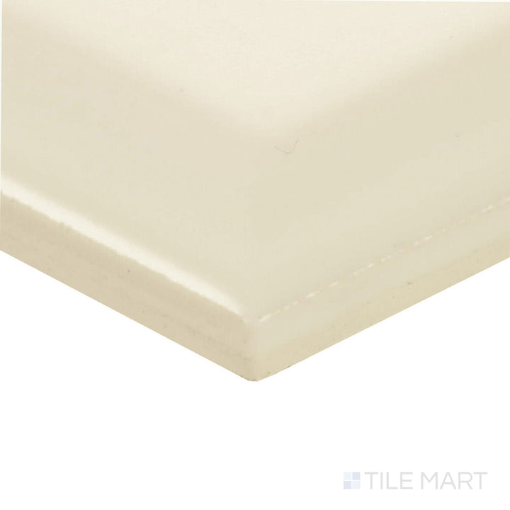 Corner view of Color Wheel Classic Biscuit 3x6 beveled matte glazed ceramic tile showcasing its soft finish and subtle warmth in a clean layout.