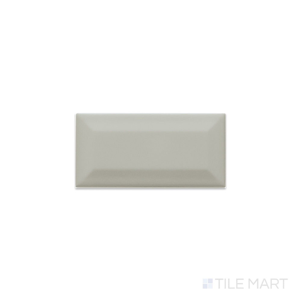 Flat-lay image of Color Wheel Classic Desert Gray 3X6 Beveled Matte Glazed Ceramic, focusing on its muted gray tone and elegant matte finish.