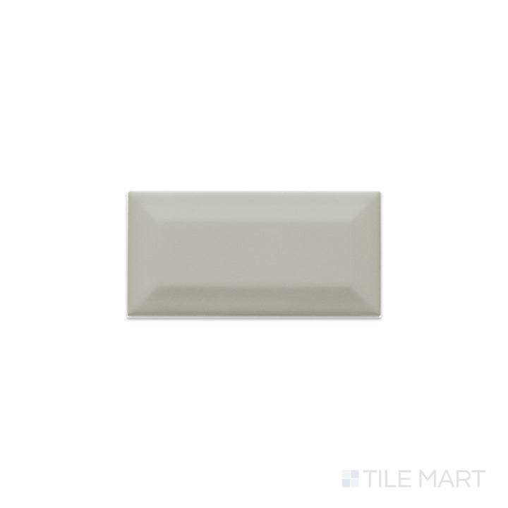 Flat-lay image of Color Wheel Classic Desert Gray 3X6 Beveled Matte Glazed Ceramic, focusing on its muted gray tone and elegant matte finish.