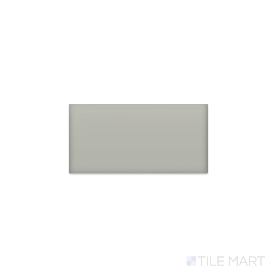 Angled shot of Color Wheel Classic Desert Gray 3x6 matte glazed ceramic tile, featuring a smooth, non-reflective surface with a cool-toned gray hue and a classic rectangular layout.  