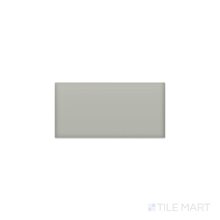 Angled shot of Color Wheel Classic Desert Gray 3x6 matte glazed ceramic tile, featuring a smooth, non-reflective surface with a cool-toned gray hue and a classic rectangular layout.  