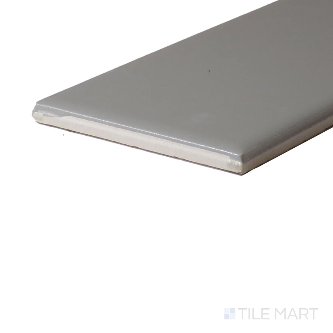 Angled close-up of Color Wheel Classic Desert Gray 3X6 Matte Glazed Ceramic, showcasing its cool gray tone with a subtle matte texture.