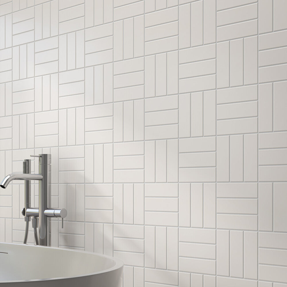In this roomscene, Color Wheel Classic Arctic White 3x6 matte glazed ceramic tile offers a clean, understated finish with a soft, velvety surface.