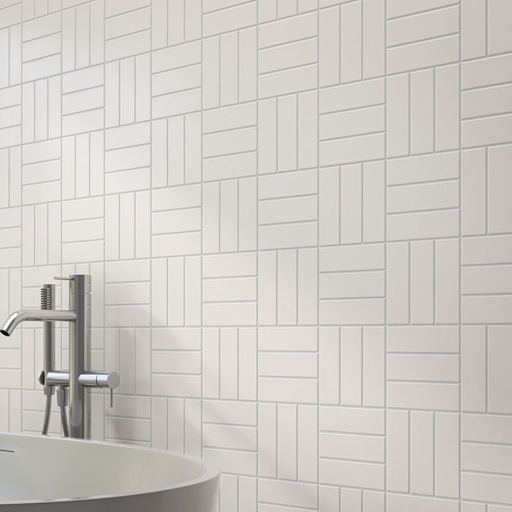 In this roomscene, Color Wheel Classic Arctic White 3x6 matte glazed ceramic tile offers a clean, understated finish with a soft, velvety surface.
