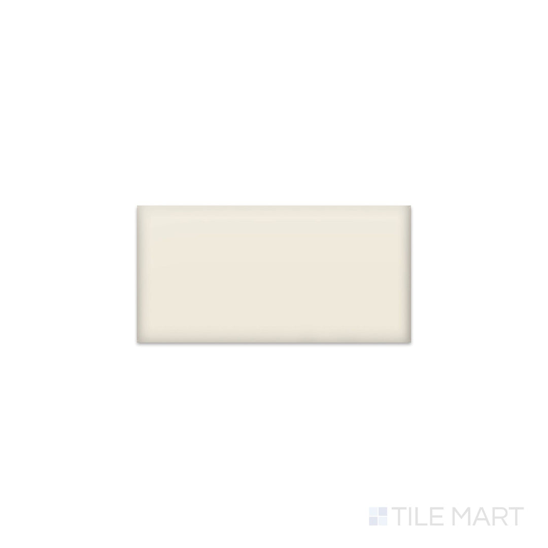 Slanted perspective of Color Wheel Classic Biscuit 3x6 matte glazed ceramic tile, emphasizing a subtle beige biscuit color, a smooth matte surface, and a rectangular subway tile format.  