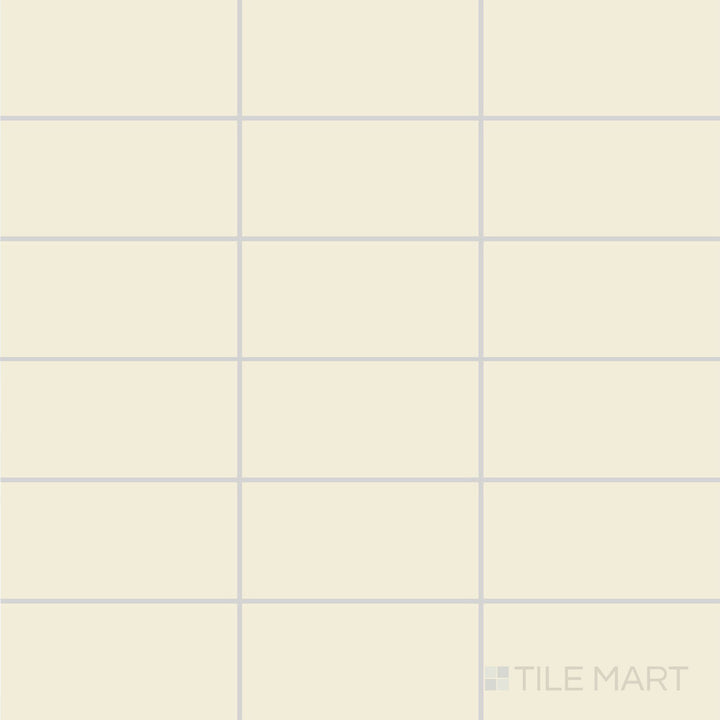 A top-down view of the Color Wheel Classic Almond 3x6 matte glazed ceramic tile reveals a soft, warm almond hue with a velvety smooth surface, perfect for timeless interior designs.