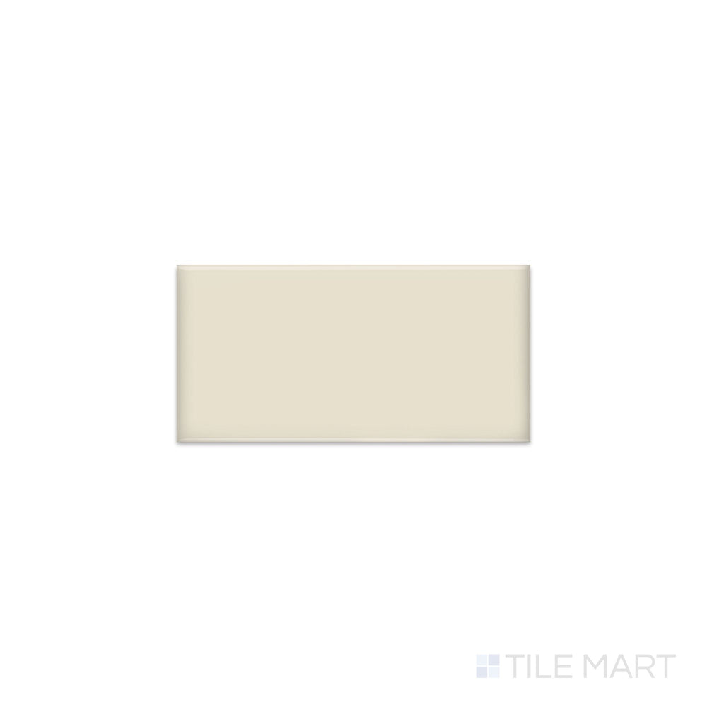 Angled shot of Color Wheel Classic Almond 3x6 matte glazed ceramic tile, featuring a warm almond hue, a soft matte finish, and a versatile rectangular profile.  
