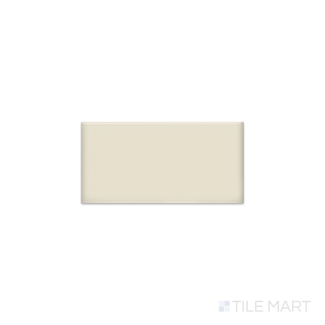 Angled shot of Color Wheel Classic Almond 3x6 matte glazed ceramic tile, featuring a warm almond hue, a soft matte finish, and a versatile rectangular profile.  