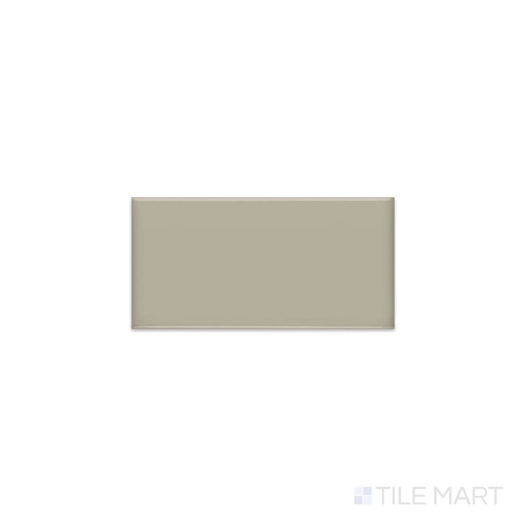 Slanted perspective of Color Wheel Classic Architectural Gray 3x6 glossy glazed ceramic tile, emphasizing a refined gray shade, a smooth polished surface, and a contemporary linear design.  