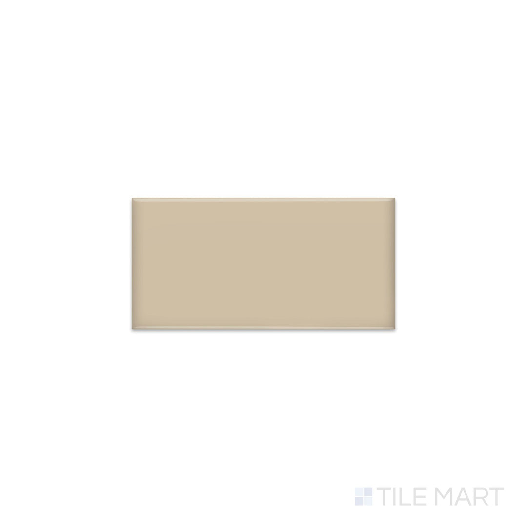 Diagonal view of Color Wheel Classic Urban Putty 3x6 glossy glazed ceramic tile, showcasing a sophisticated neutral putty color, a glossy reflective surface, and a versatile rectangular format.  