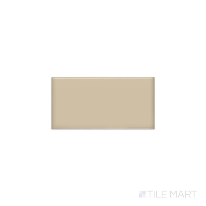 Diagonal view of Color Wheel Classic Urban Putty 3x6 glossy glazed ceramic tile, showcasing a sophisticated neutral putty color, a glossy reflective surface, and a versatile rectangular format.  